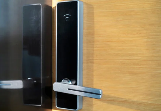 Closeup of a door handle and digital lock