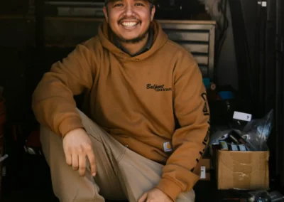 A worker in the back of a Balport van